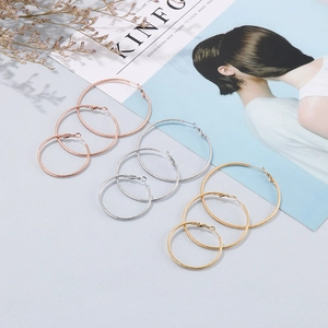 Textured hoop earrings set in gold silver and rose gold finishes in three sizes