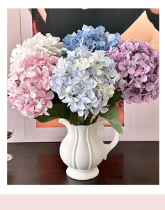 Detail of 3D printed hydrangea bouquet in a white ceramic vase for home table decor