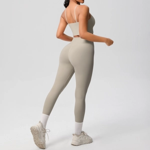 Detail of khaki seamless yoga set featuring thin strap bra and high waist leggings