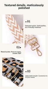 Close-up of bohemian shoulder strap with golden 360-degree rotating snap hook detail