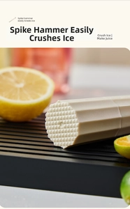 Macro view of beige cocktail muddler with spike head for crushing lemon and lime