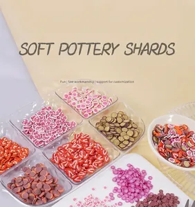 Detailed collection of assorted polymer clay fruit slices and colorful charms for DIY crafts