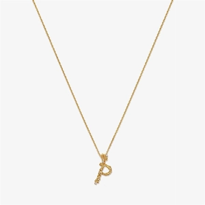 Detailed view of gold letter P pendant with lava texture and crystals on a fine chain