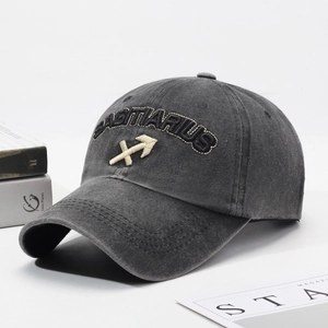 Vintage washed dark grey cotton baseball cap with Sagittarius embroidery on white background