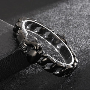 Punk style black stainless steel cuban chain bracelet featuring a boxing glove charm