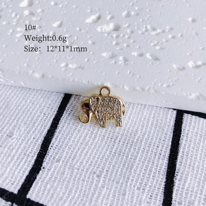 Detailed view of 10# gold elephant pendant with pavé cubic zirconia 12x11x1mm