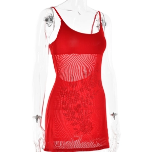 Detail of red mesh mini dress featuring sparkly rhinestone floral patterns and fine straps