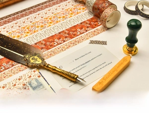 Vintage floral washi tape set with feather pen, wax seal stamp, and decorative sealing wax