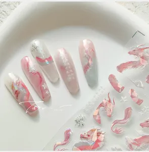 Detail of 5D laser iridescent dragon nail stickers with traditional Chinese art motifs