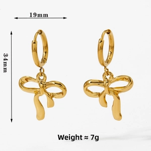 Detail of golden bow pendant earrings with dimensions 19mm width and 34mm height