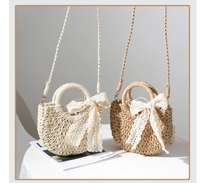 Detailed view of woven straw handbags with lace bows in beige and light brown finishes