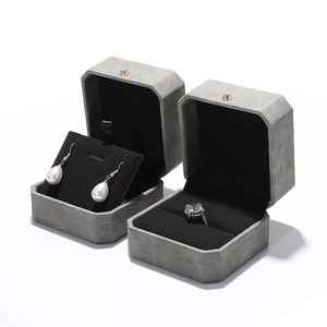 Octagonal grey velvet jewelry box set for rings and earrings on a white background