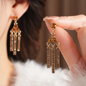 Vintage gold-plated multi-layer necklace and amber crystal earring set on model
