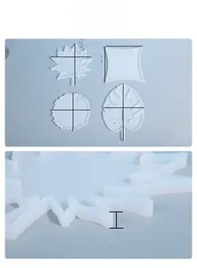 Macro detail of 10mm thick translucent silicone coaster molds in maple and leaf shapes