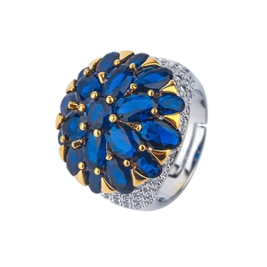 Vintage royal flower cocktail ring with blue spinel marquise gems and gold prongs