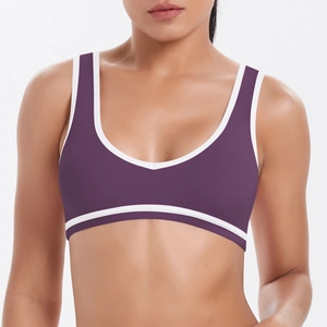 Soutien-gorge de sport bicolore violet et blanc avec larges bretelles pour yoga et fitness
