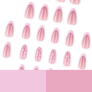 Pink French almond press on nails with white floral patterns and dynamic wavy lines