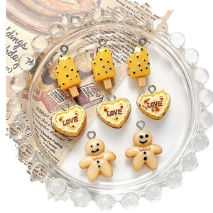 Resin DIY heart cake and ice cream charms set displayed on a decorative glass tray