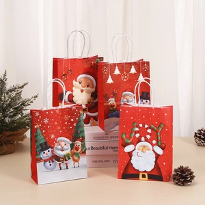 Set of four red Christmas kraft paper gift bags with Santa Claus and festive holiday patterns