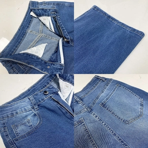 Detailed views of high-waisted denim jeans featuring metal zipper and washed blue fabric