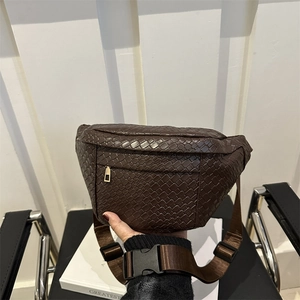 Deep brown woven leather chest bag with golden zipper and adjustable nylon strap