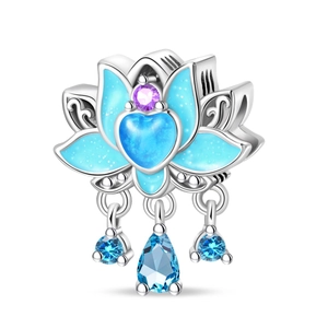 Detailed blue enamel lotus and heart charm with sparkling cubic zirconia teardrops