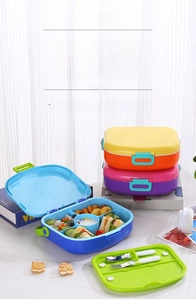 Detail view of a 5-compartment portable lunch box with built-in cutlery for kids
