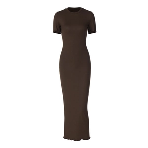 Detailed view of the dark brown ribbed knit fabric and lettuce edge trim of the dress