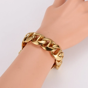 Classic gold stainless steel chunky woven bracelet shown on wrist for fashion couples