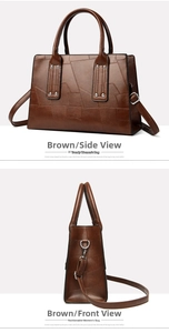 Detail view of brown crocodile pattern handbag showing side profile and metal feet