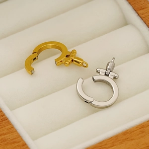 Macro view of 18K gold and silver plated jewelry bails with hinged closure detail