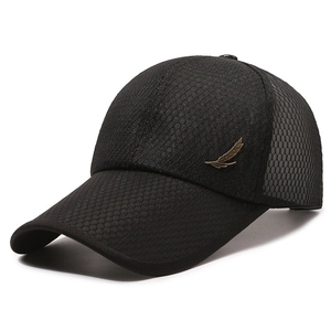 Black mesh baseball cap with extended brim and gold feather metal accent in side view