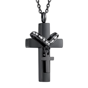 Detail of black stainless steel cross cremation necklace with sparkling crystal inlay
