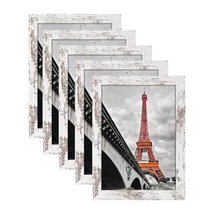 Set of five shabby chic white wooden frames featuring Eiffel Tower art photography