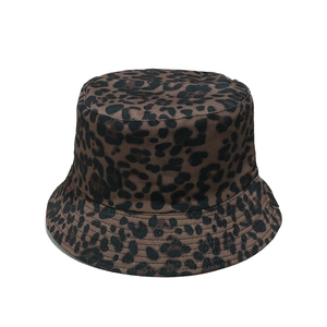 Fashionable leopard print bucket hat with satin finish and reinforced stitching for sun protection