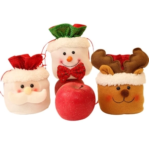 Christmas drawstring gift bags featuring Santa, snowman, and reindeer festive designs