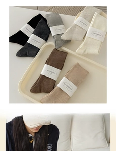 Detailed view of seven-color ribbed cotton crew socks set in minimalist presentation