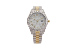 Detail view of two-tone crystal encrusted watch with Roman numeral dial and date window