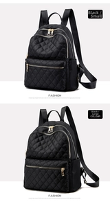 Comparison of black quilted nylon backpacks in small and large sizes with gold zippers