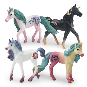 Set di quattro statuette di unicorni colorati con glitter e motivi floreali dettagliati
