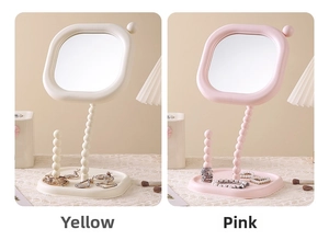 Desktop makeup mirror with pearl-style stand and jewelry tray in cream and pink