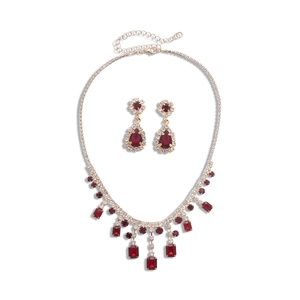 Luxury geometric tassel necklace and earrings set with red rhinestones in gold finish
