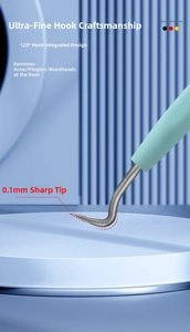 Close-up of 125-degree curved acne needle with 0.1mm ultra-fine tip on blue stand
