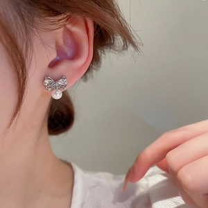 Elegant bow knot pearl earrings with sparkling crystals and silver finish for women