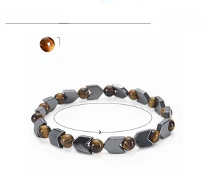 Detail view of 6mm tiger eye stone beads and hematite arrow spacers bracelet