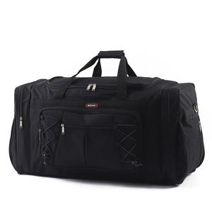 Large capacity black waterproof travel bag with reinforced handles and shoulder strap
