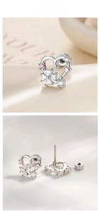 Detail of silver heart flower earrings with pink and white cubic zirconia stones