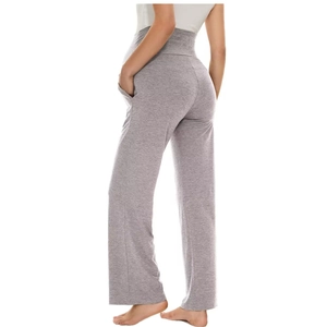 Detail view of high-waisted maternity yoga pants in grey with side pocket and elastic waist