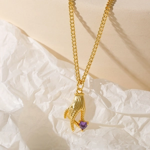 18k gold plated necklace featuring a hand holding a purple heart zircon pendant
