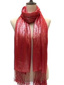 Close-up of red sparkling scarf with fringes on a mannequin for evening party wear